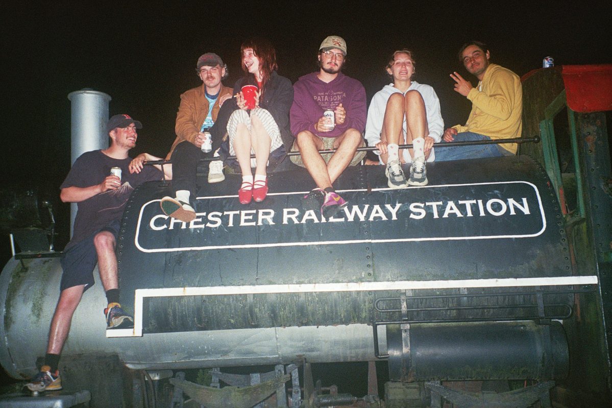 The cast and crew on the Chester Railway Station sign